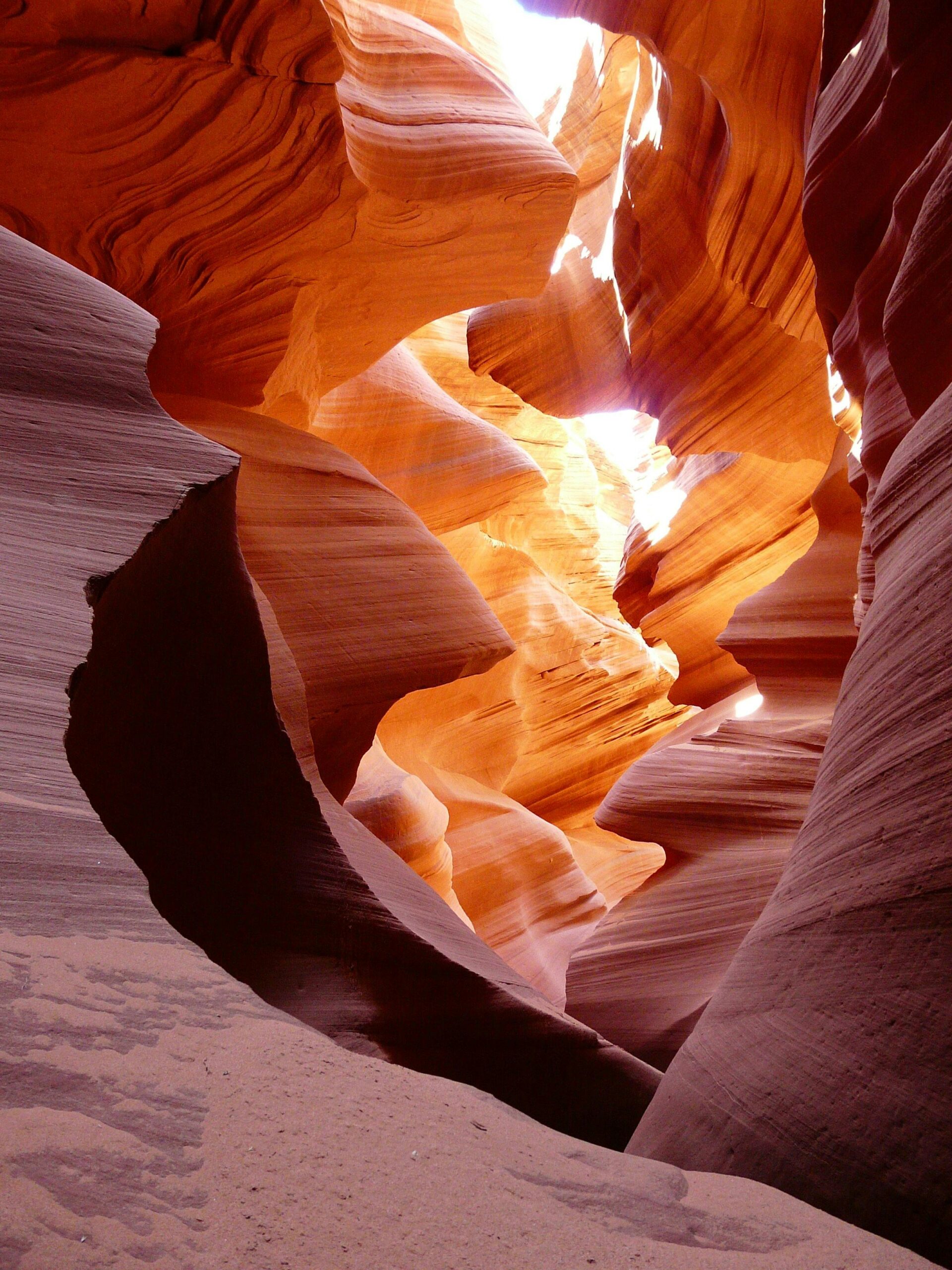 Stunning view of Antelope Canyon with vibrant sunlit rock formations showcasing natural beauty.